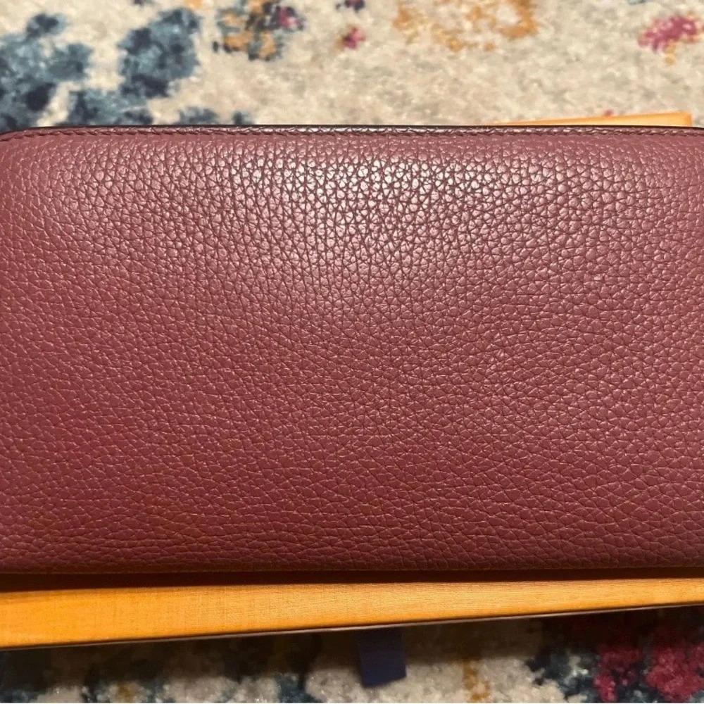 Dior Mauve Pebbled Leather Zip Wallet with Silver Charm